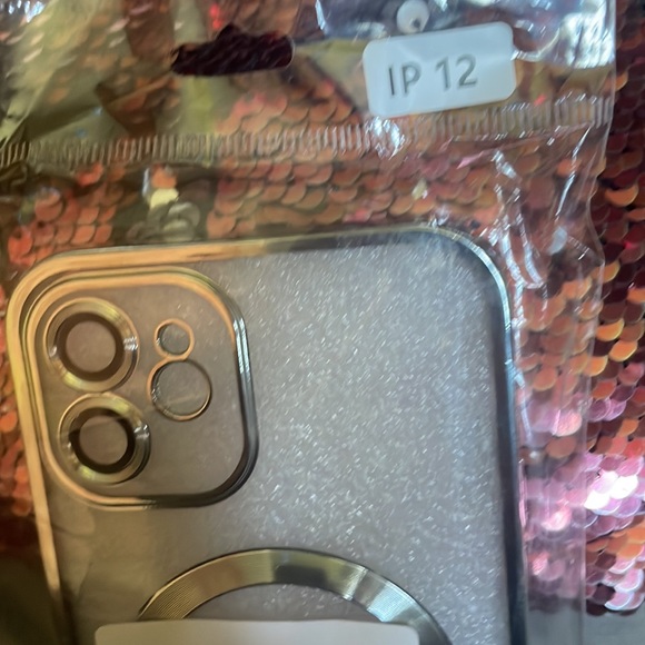 IPHONE 12 charging phone case CLEAR with silver on the charging circle on back:) - Picture 3 of 7